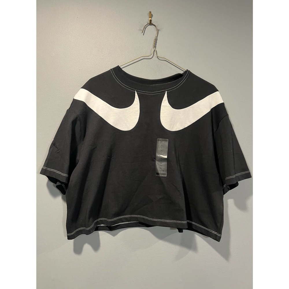 *Woman’s Black Nike Crop Top